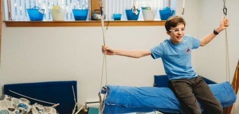 boy-on-swing-Boston-Sensory-Solutions